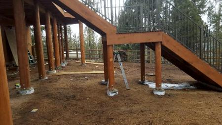 Custom deck wrap around deck with 10” log posts from Colorado Springs Deck Builder